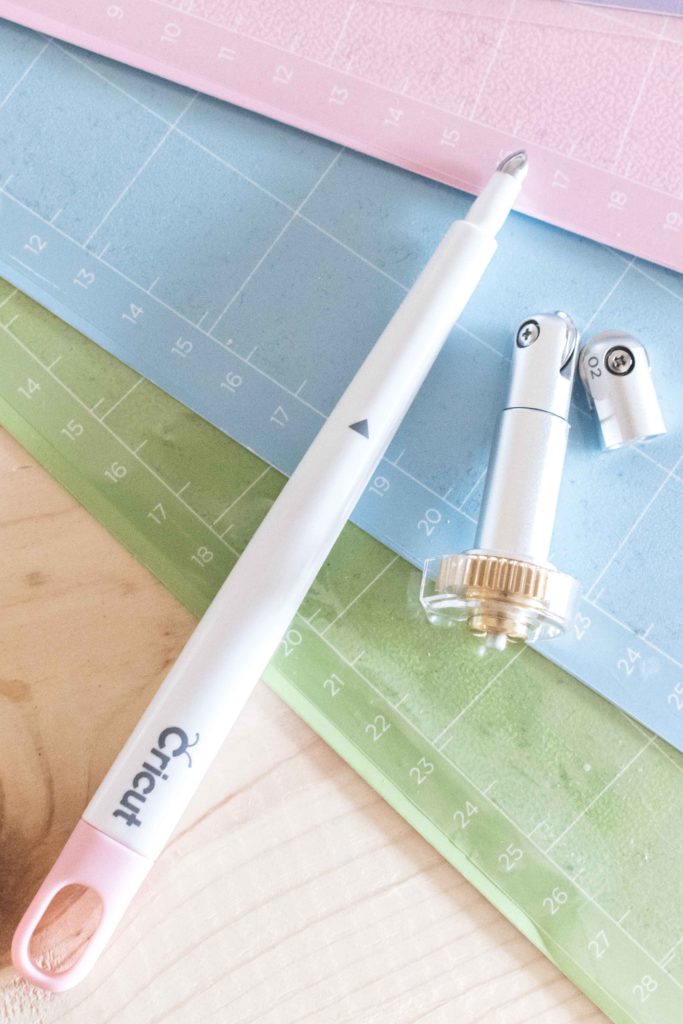Scoring Stylus and Scoring Wheel on top of Cricut Mats