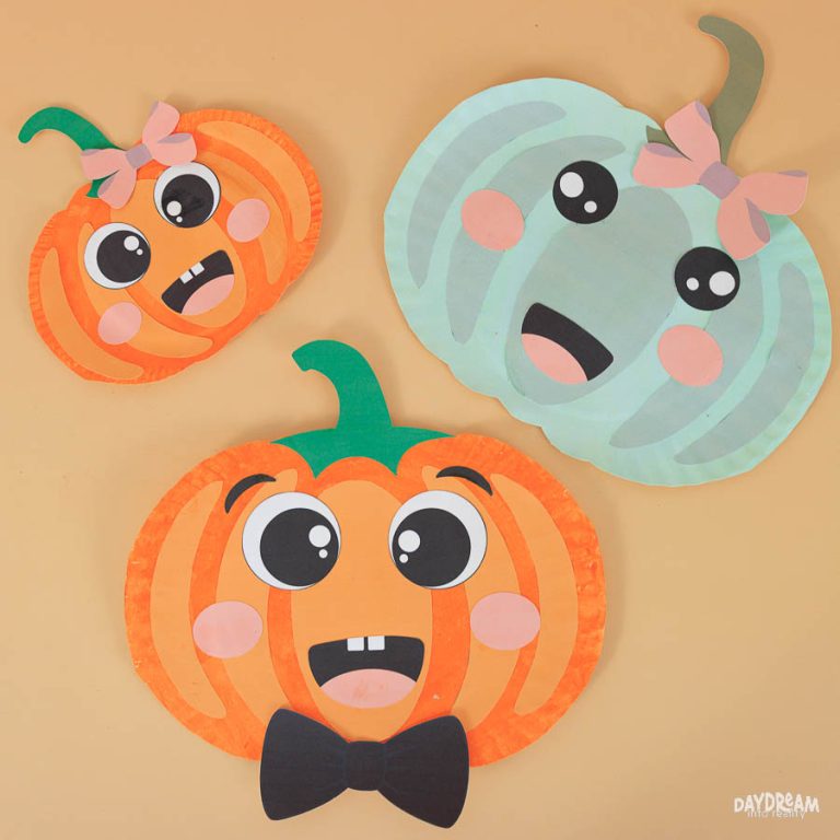 Three different paper plate pumpkins (Large and small orange, and sage green)